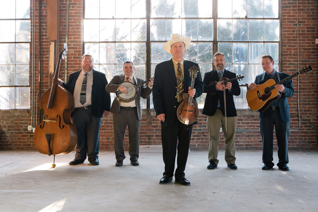 David Davis and the Warrior River Boys - holding their instruments